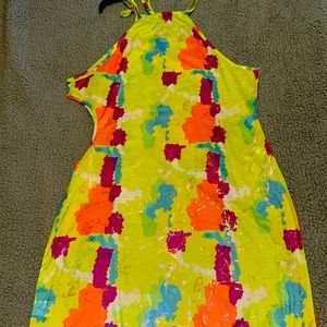 New never worn summer dress with the opening on the left side